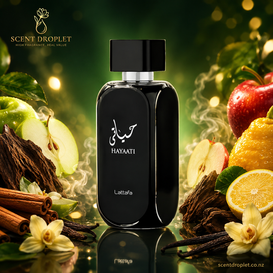 Hayaati by Lattafa EDP bottle surrounded by apple, bergamot, cinnamon and vanilla