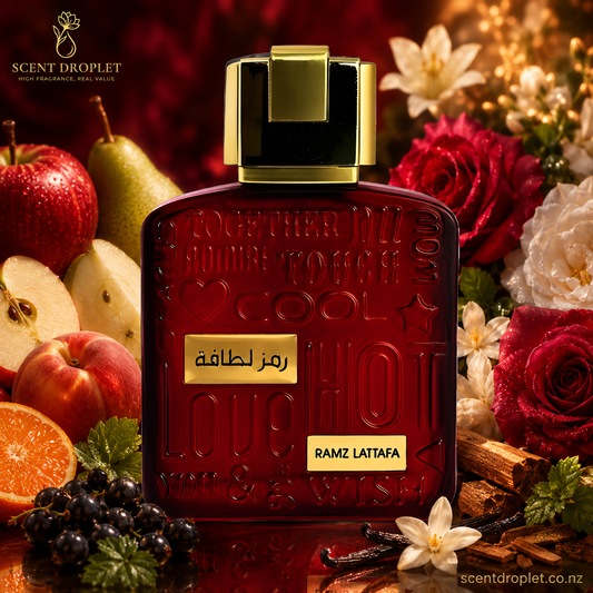 Ramz Gold by Lattafa EDP bottle surrounded by apple, peach, rose and jasmine